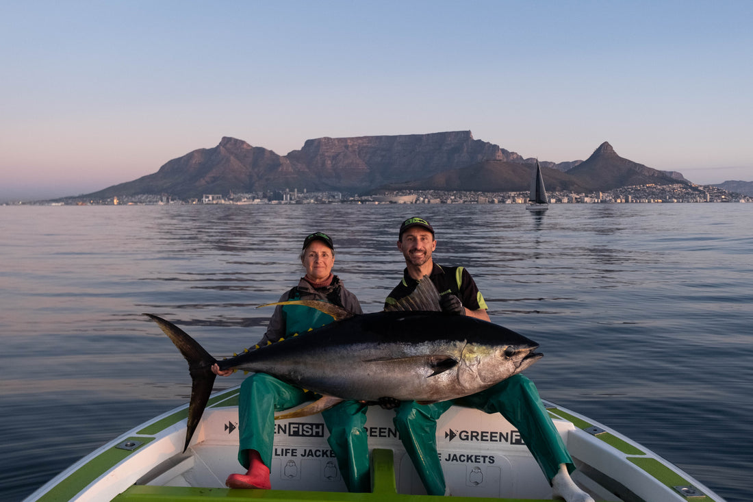 Catching a Big Yellowfin Tuna with my Mom and Table Mountain backdrop